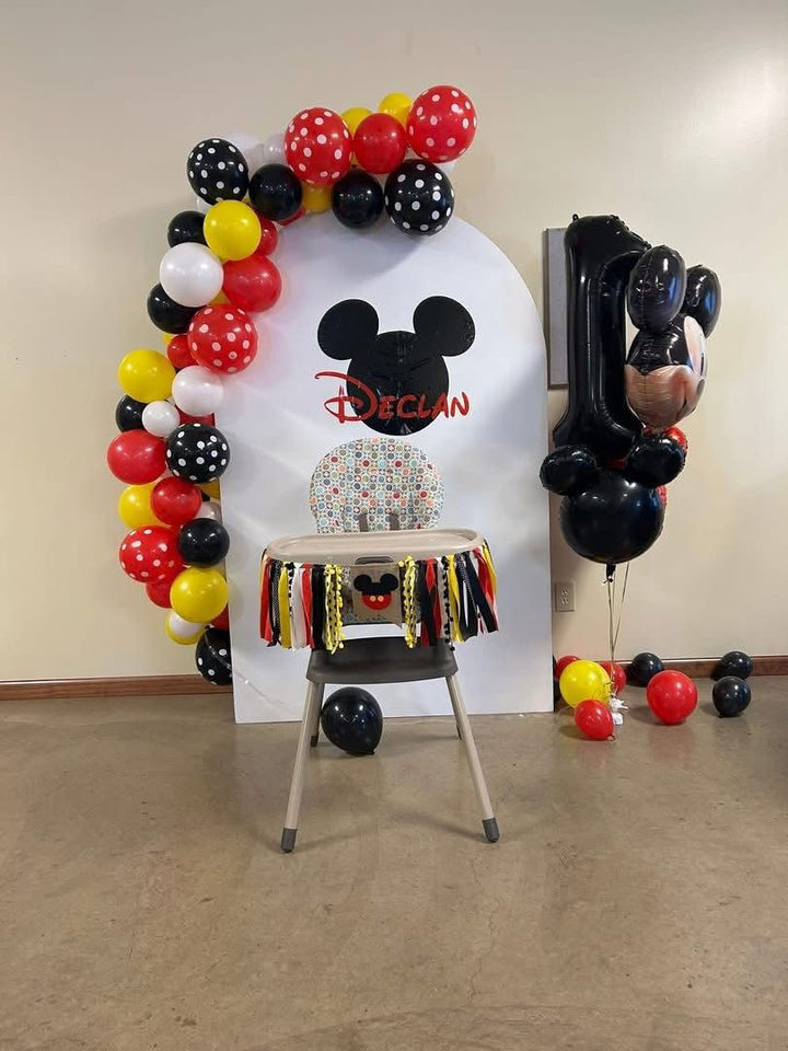 6th custom event backdrop panel featuring a Mickey Mouse theme with colorful balloons and a decorated high chair for a birthday celebration.