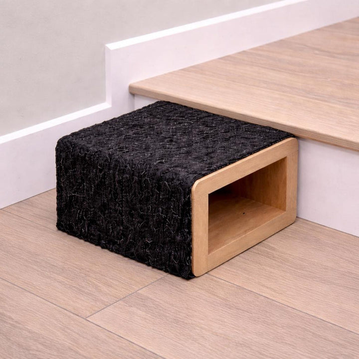 Non-slip dog stairs featuring a carpeted surface and wooden base, designed for pet safety and stability.