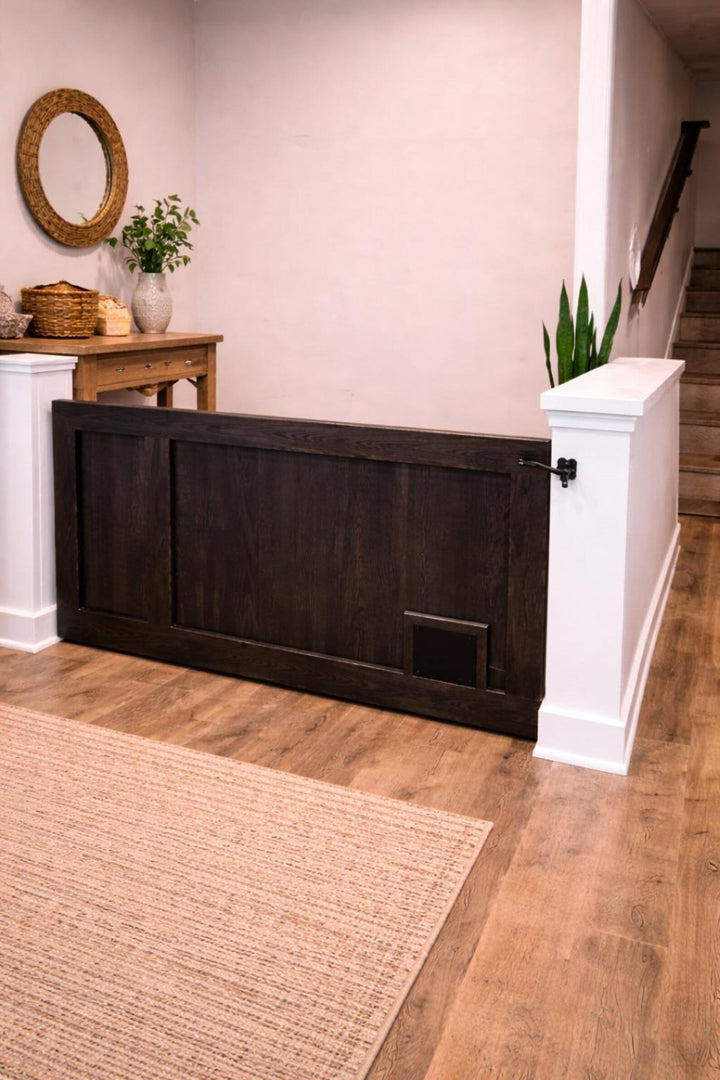 Cat Passage Gate with Pet Opening | Wood Baby Gate installed in a hallway with wood flooring.