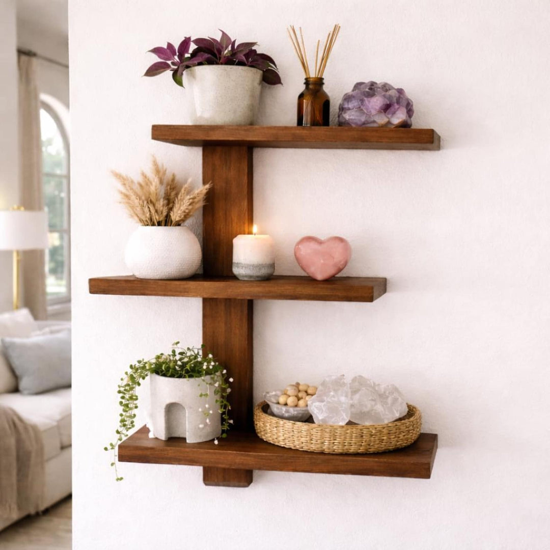 Floating wood trinket shelves displaying plants, crystals, and décor for a cozy and organized space.