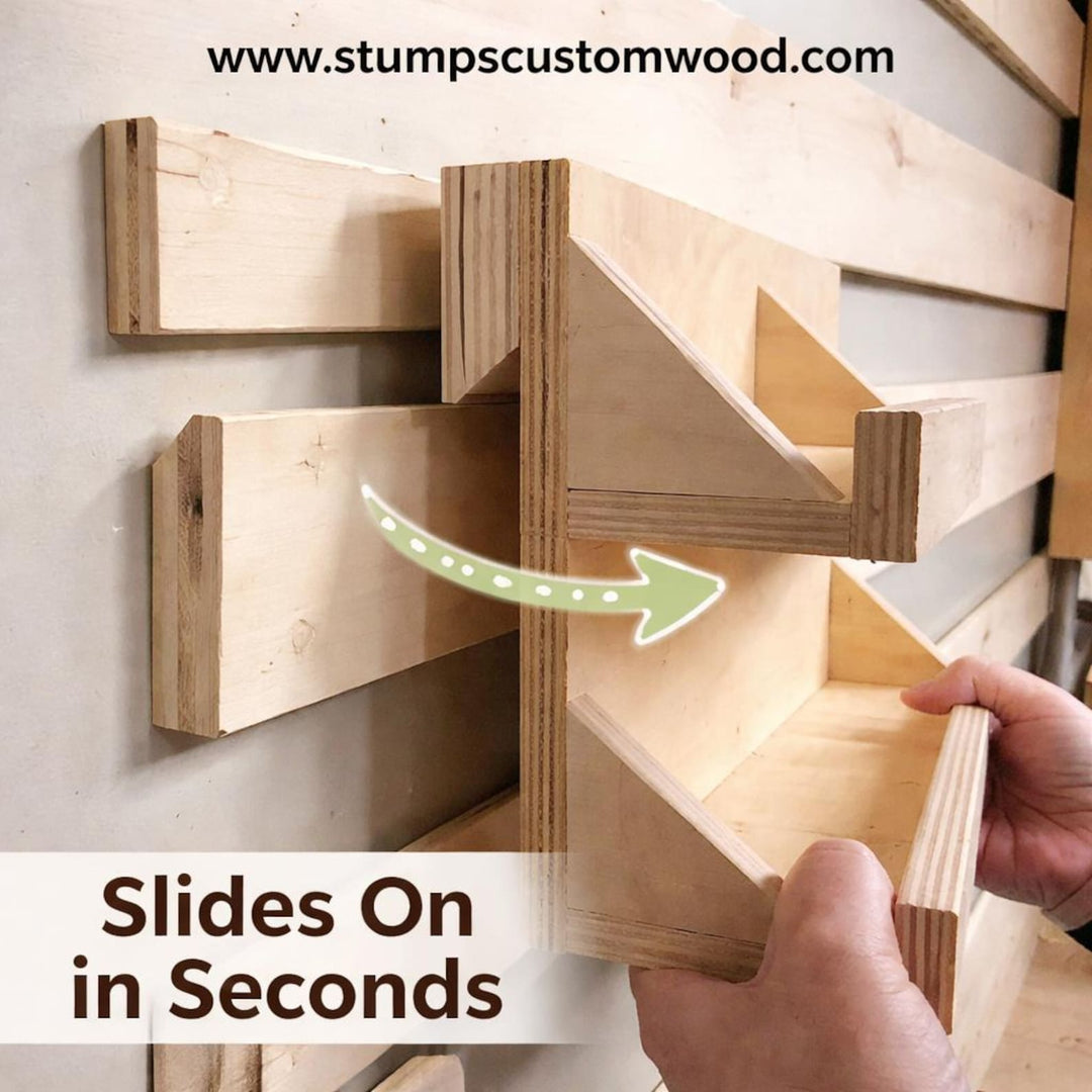 Custom wood french cleat shelf system showing sliding feature for easy setup and adjustments.