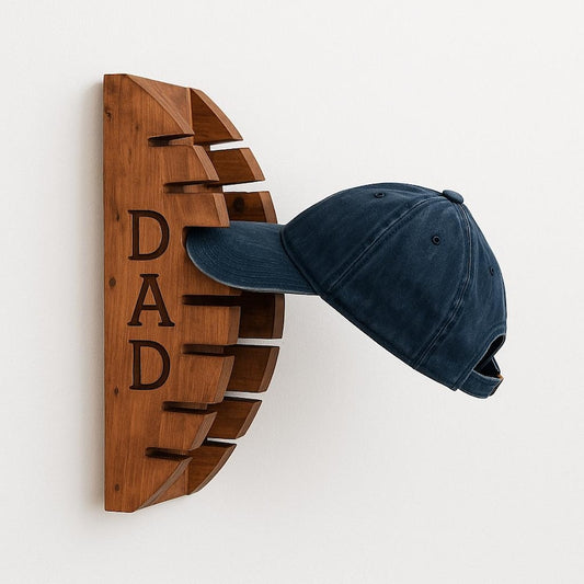 personalized hat organizer with a blue cap mounted on a wooden rack engraved with 'DAD'
