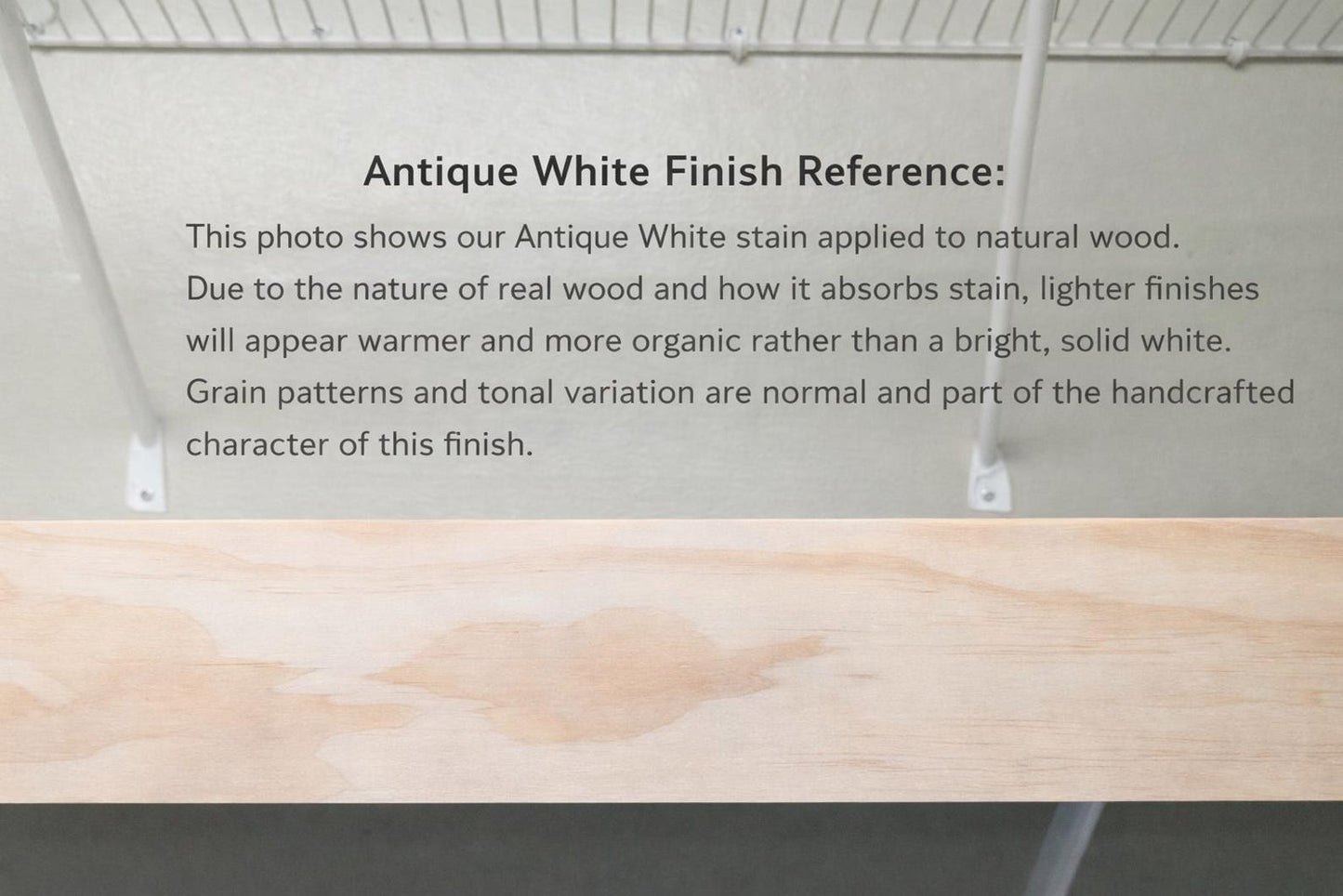 modern sliding slat baby gate reference showing natural wood stain characteristics and variations in grain pattern.