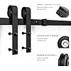 Heavy duty sliding barn door hardware with smooth gliding rollers and sturdy brackets for easy installation.