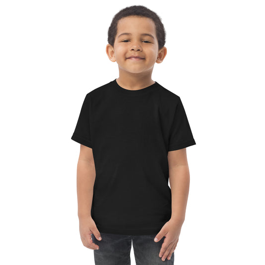 Stumps Custom Wood Toddler jersey t-shirt displayed on a smiling child wearing a black t-shirt.