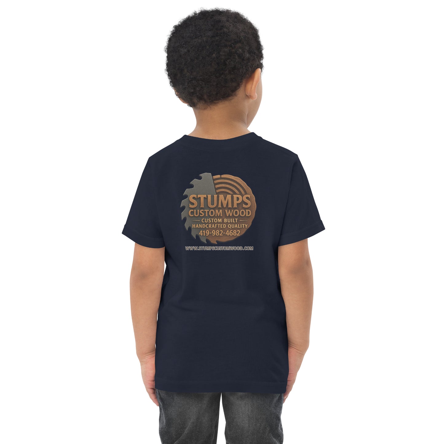 Boy wearing Stumps Custom Wood Toddler jersey t-shirt with logo on back, perfect for comfort and adventure.