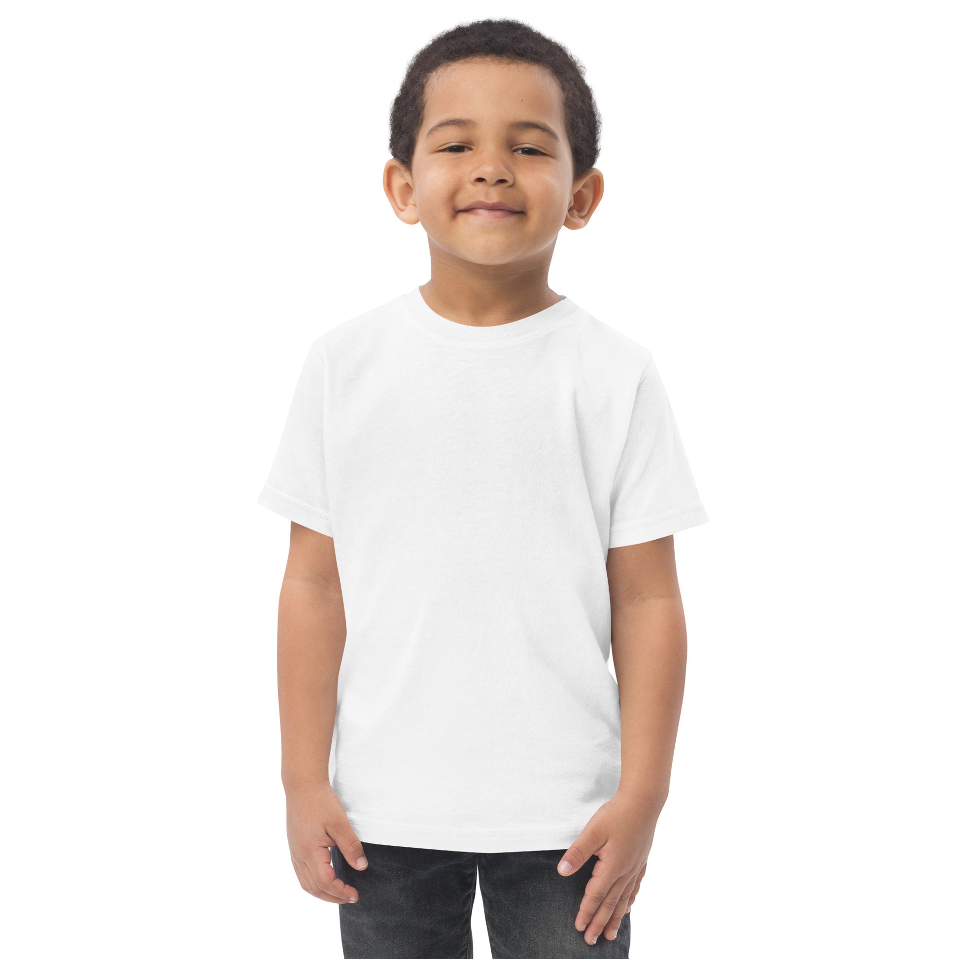 Smiling child wearing a Stumps Custom Wood Toddler jersey t-shirt, showcasing soft and comfortable fabric for everyday adventures.
