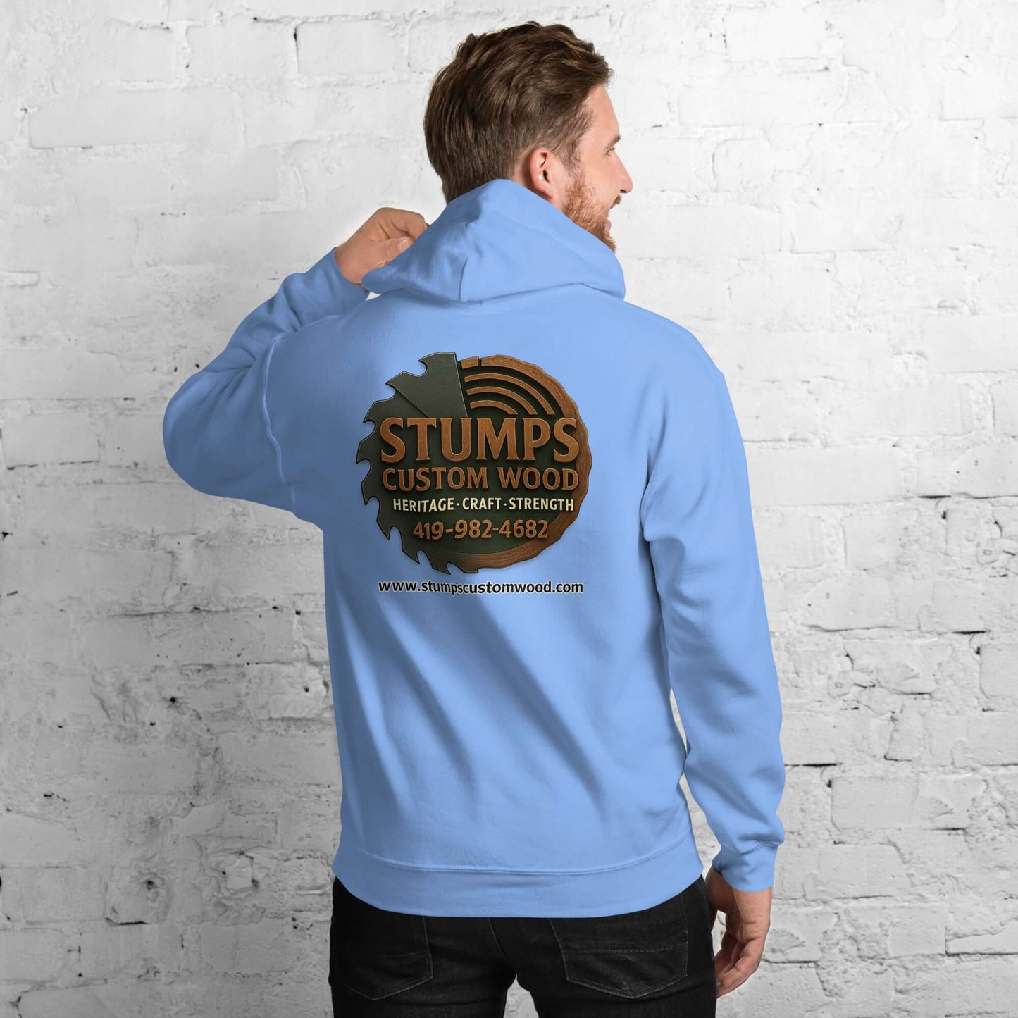 Stumps Custom Wood Unisex Hoodie in light blue featuring a logo on the back, perfect for cozy evenings.