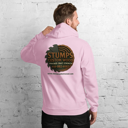 Man wearing a Stumps Custom Wood Unisex Hoodie in pink, showcasing the logo on the back.